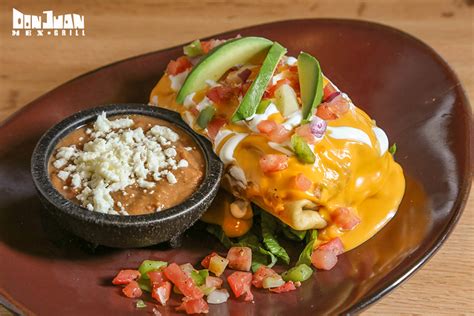 Don juan mex grill - 12 inch fried burrito on top of lettuce, filled with Mexican rice, queso and your choice of protein. Topped with more queso, sour cream, pico de gallo and sliced avocado. Grande Quesadilla $10.95 